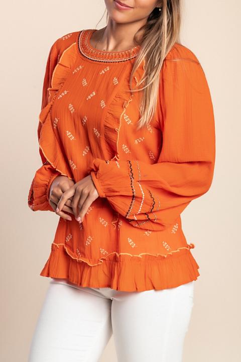 A modelo tem 168 cm de altura e veste tamanho P